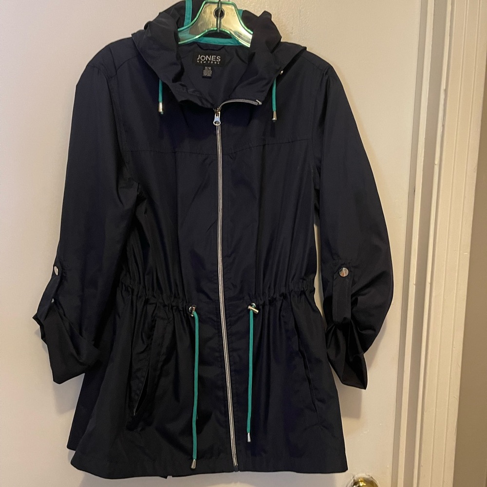Drawstring parka rain jacket with hood.